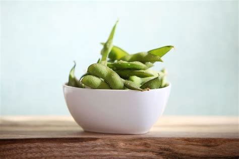 Soybeans, green, raw (includes edamame) 48. . How many edamame beans in a cup